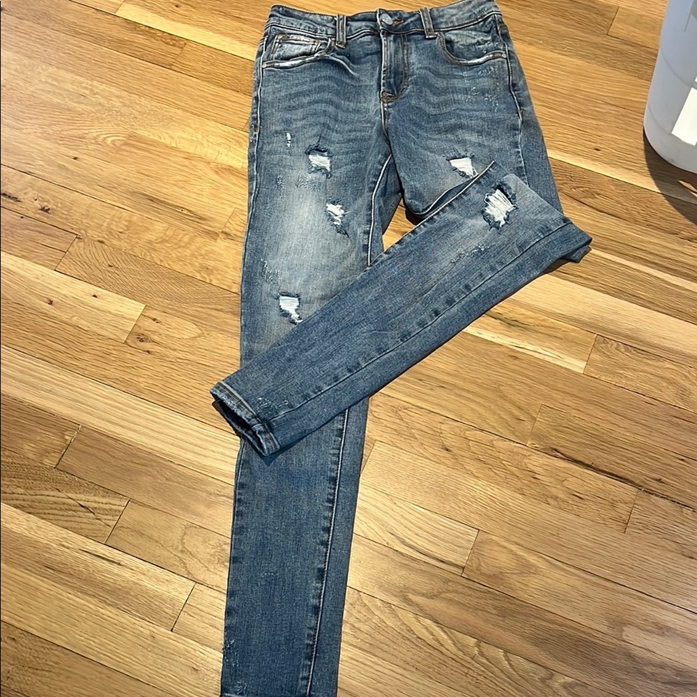 Blue Distressed Skinny Jeans with Tapered Leg